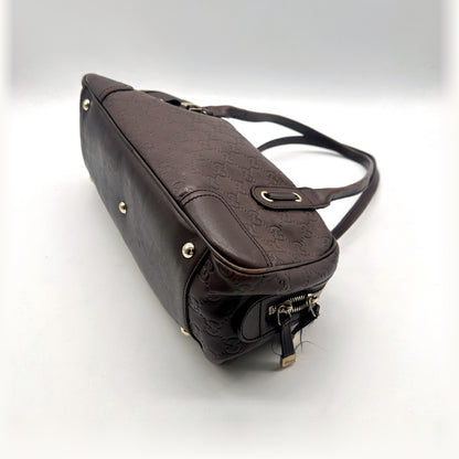 Gucci Bowling Cuir Guccissima Marron - vue en angle, base et pieds métalliques