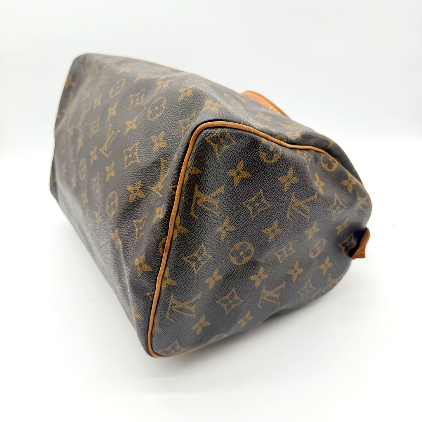 Louis Vuitton Speedy 30 toile Monogram - base et angles, passepoil en cuir