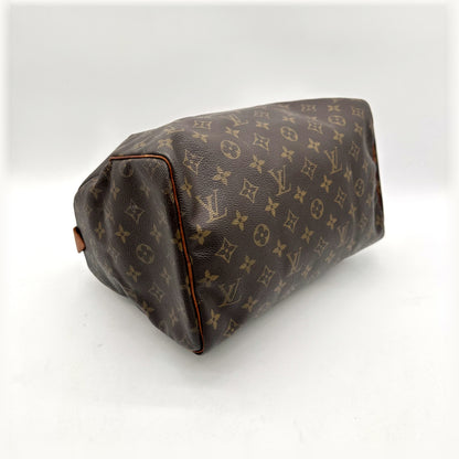 Louis Vuitton Speedy 30 Toile Monogram - vue du dessous, base et coins