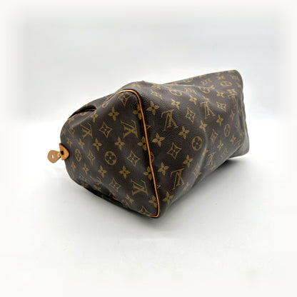 Louis Vuitton Speedy 30 Toile Monogram - vue du dessous en angle opposé