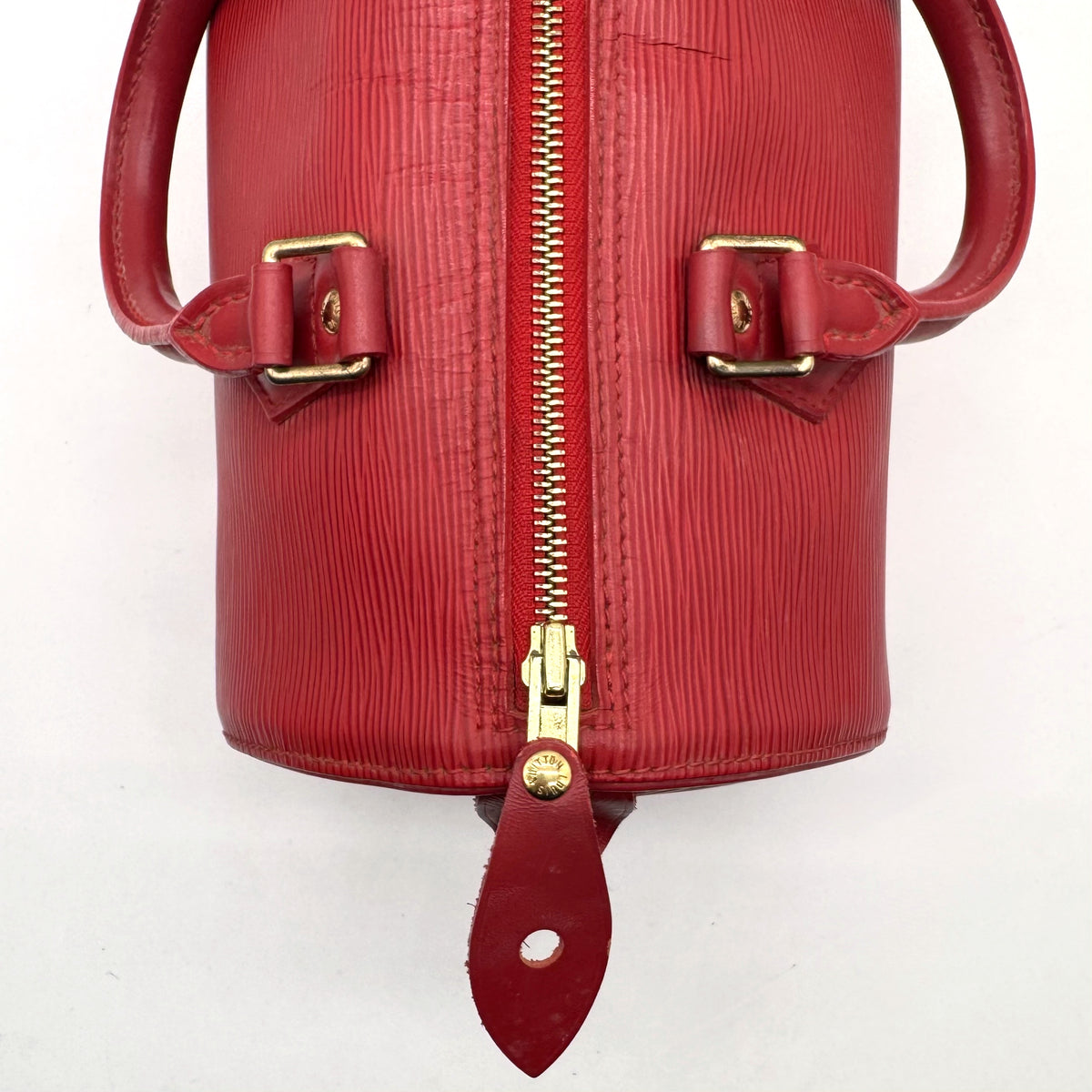 Louis Vuitton Speedy 25 Cuir Épi Rouge - détail des attaches d'anses et du zip