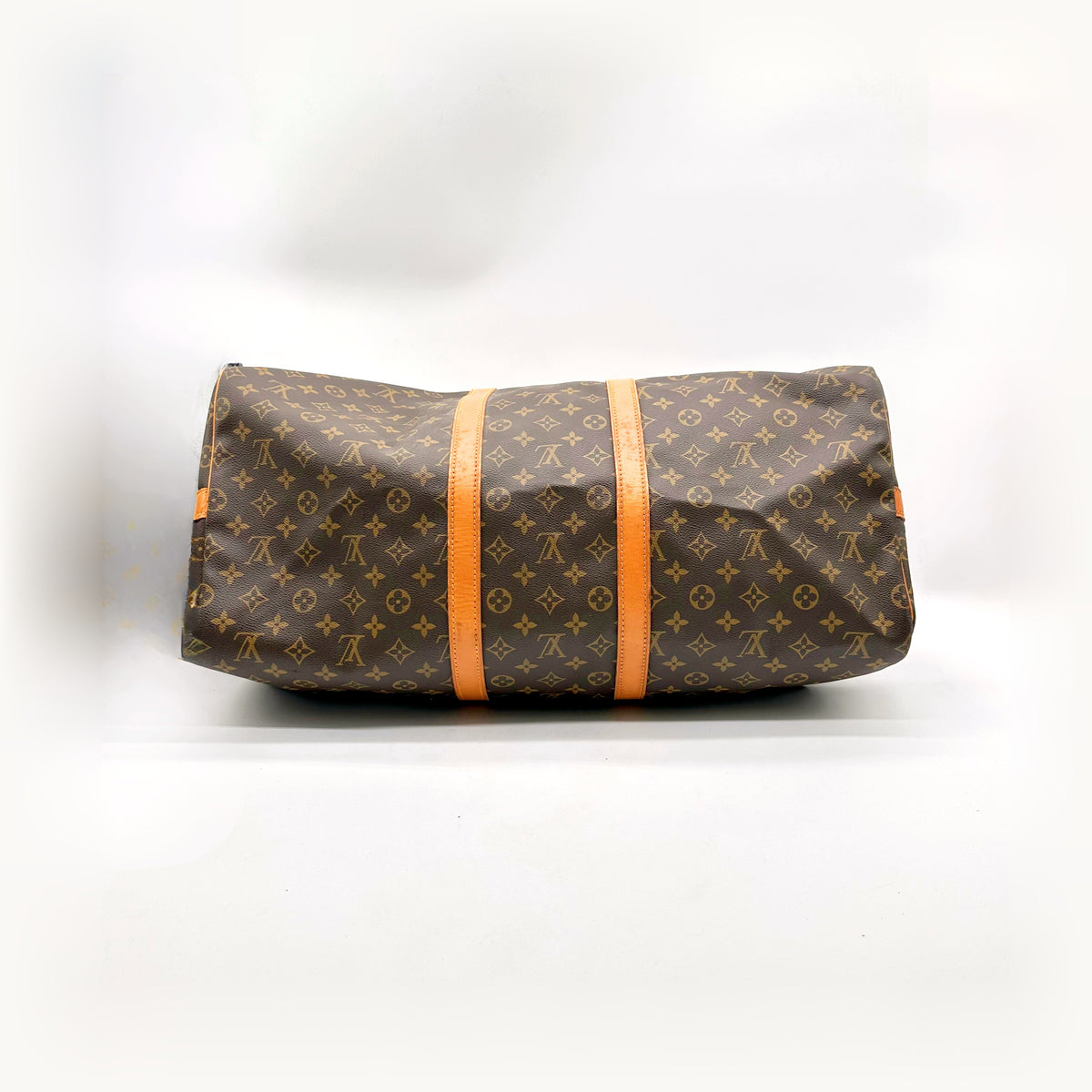 Louis Vuitton Keepall Bandoulière 55 Toile Monogram - vue de côté, sac couché sur toute sa longueur