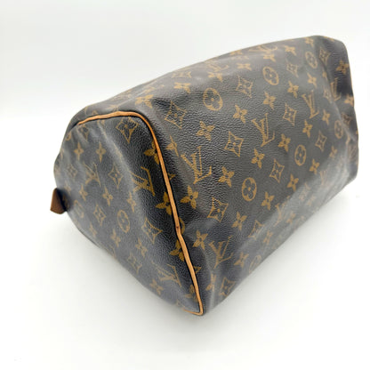 Louis Vuitton Speedy 30 toile Monogram - base et angles côté opposé