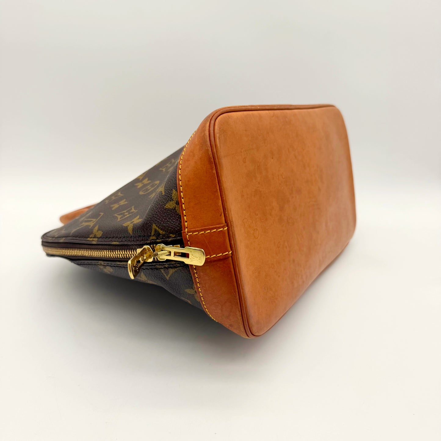 Louis Vuitton Alma Toile Monogram - base et curseurs