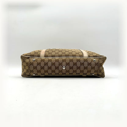 Gucci Cabas Toile GG Beige - vue de la tranche, sac posé à plat