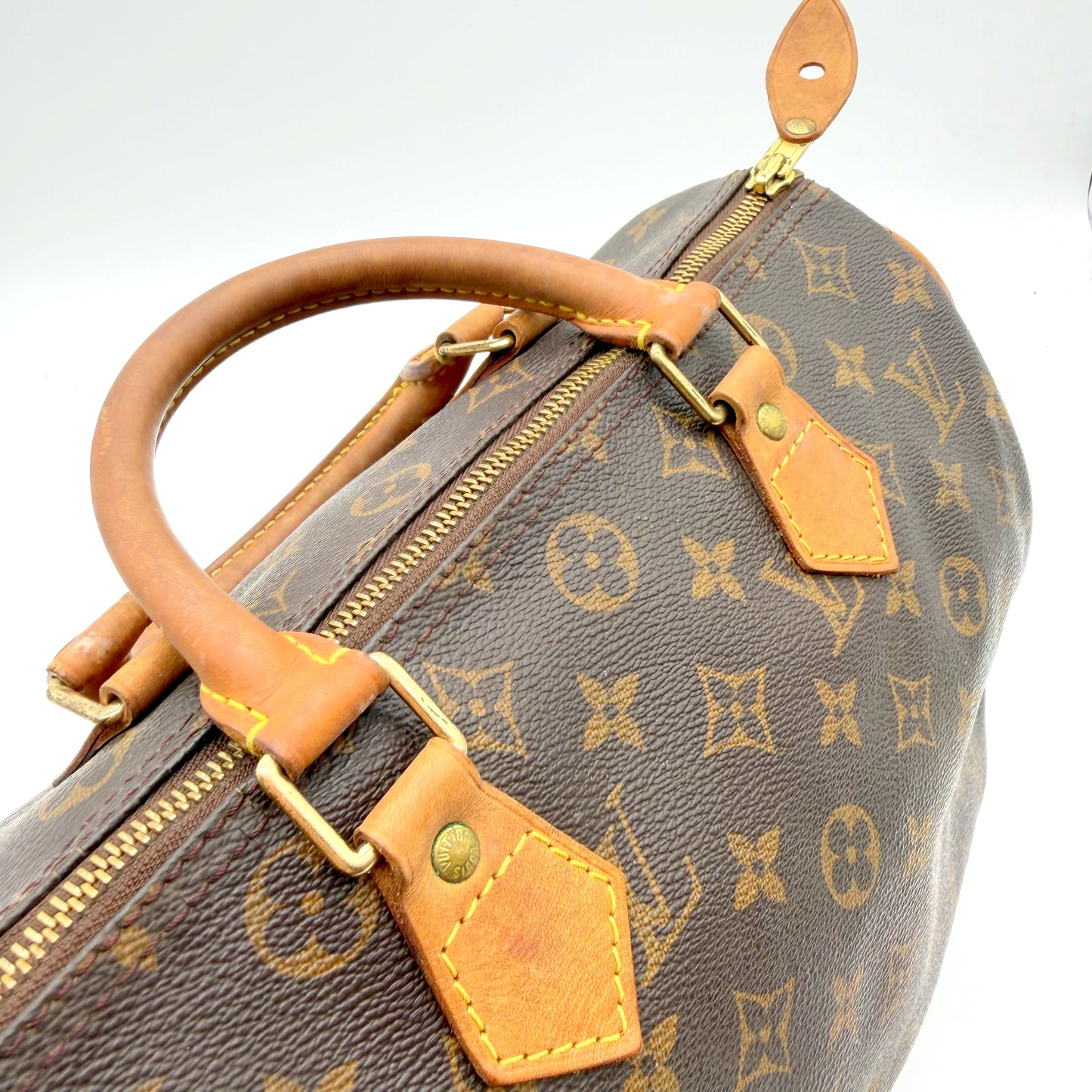 Louis Vuitton Speedy 30 toile Monogram - anses en cuir vachetta et zip