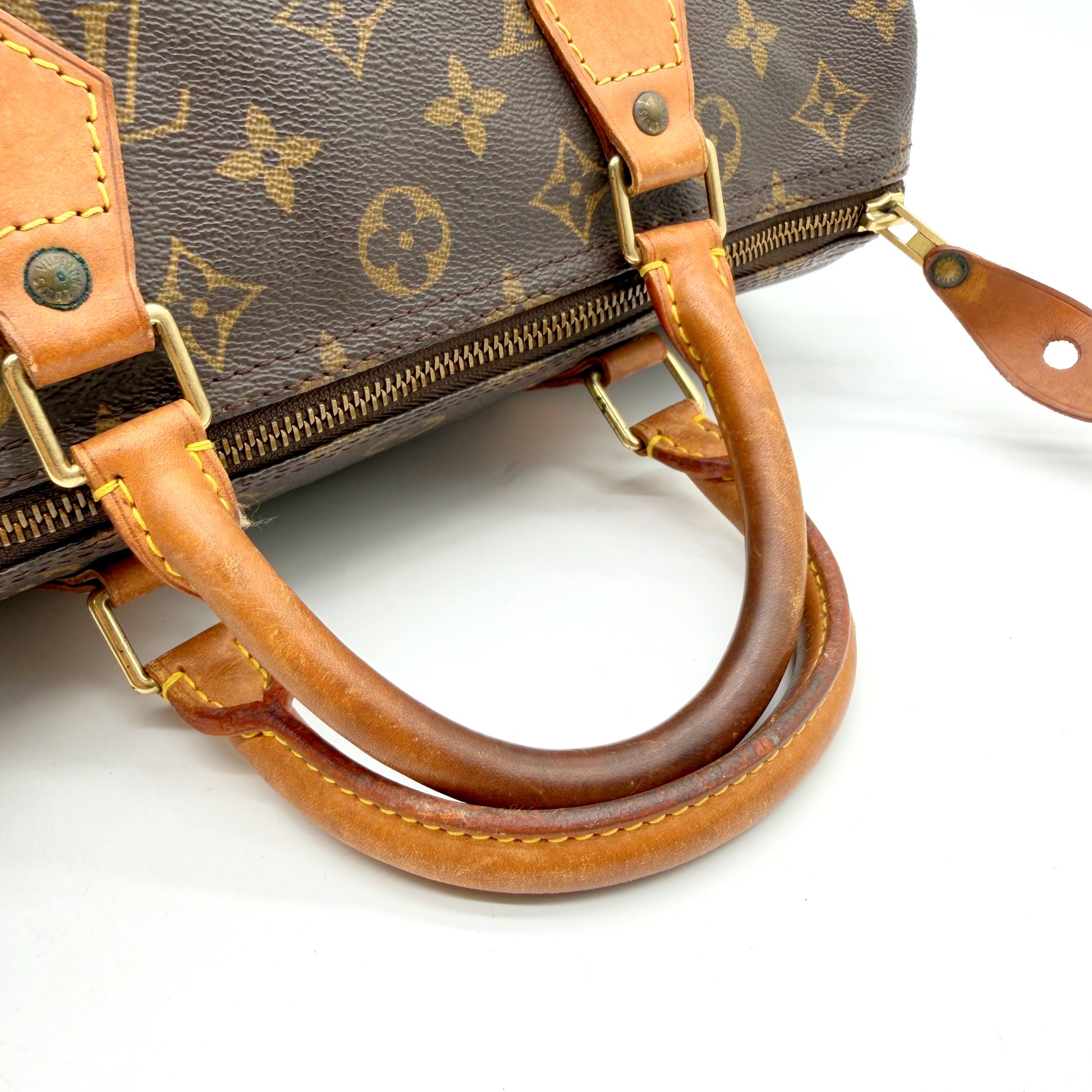 Louis Vuitton Speedy 30 Toile Monogram - anses en cuir vachetta et zip, vue A