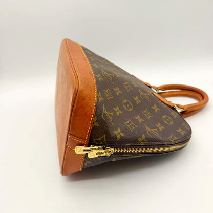 Louis Vuitton Alma Toile Monogram - vue de trois quarts