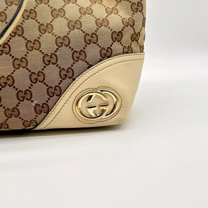 Gucci Tote toile GG - angle inférieur et médaillon latéral