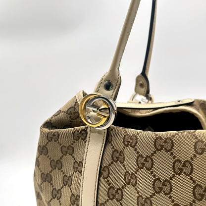 Gucci Cabas Toile GG Beige - détail du haut du sac et de l'anneau entrelacé