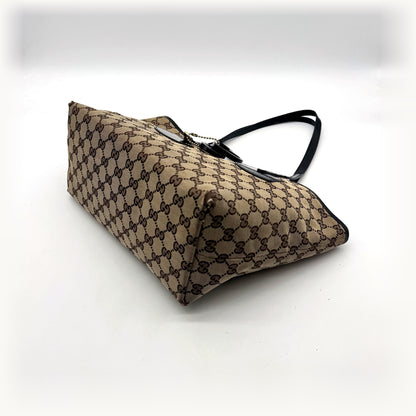 Gucci Tote Toile GG Beige et Cuir Verni Noir - vue en angle, cabas couché