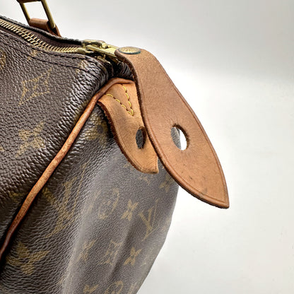 Louis Vuitton Speedy 30 Toile Monogram - détail du tirant de cuir et du zip