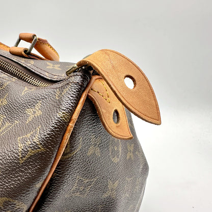 Louis Vuitton Speedy 35 Toile Monogram - détail du tirant de cuir et du zip