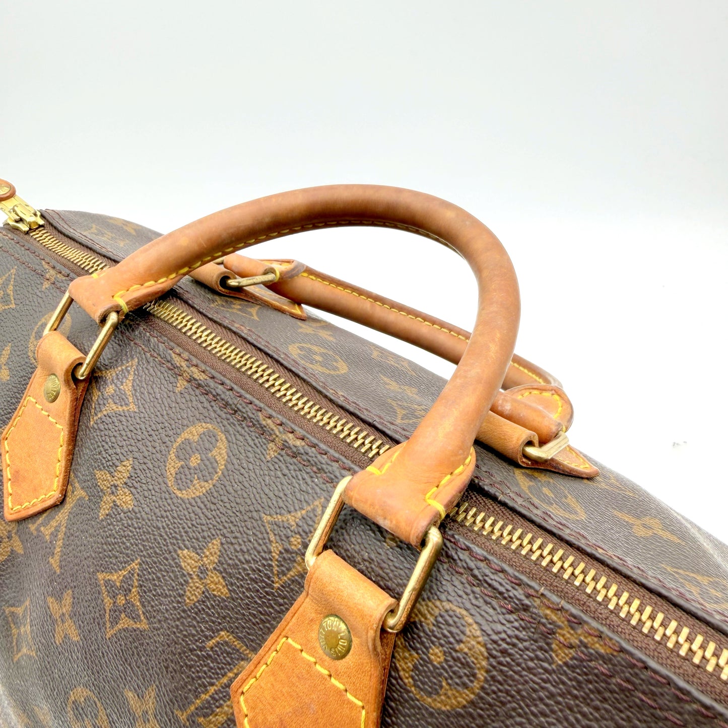 Louis Vuitton Speedy 30 toile Monogram - anses et attaches vues du second côté
