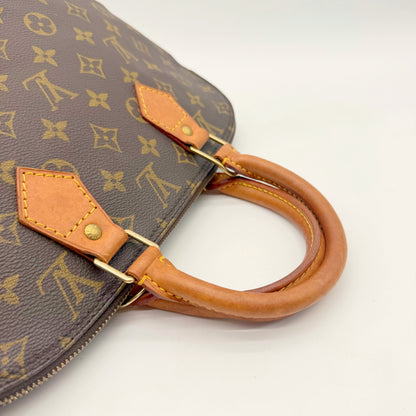 Louis Vuitton Alma Toile Monogram - anses en cuir naturel