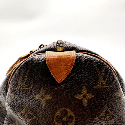 Louis Vuitton Speedy 30 Toile Monogram - détail de la patte de cuir d'extrémité