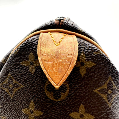 Louis Vuitton Speedy 35 Toile Monogram - détail de la patte de cuir d'extrémité