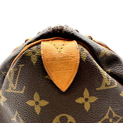 Louis Vuitton Speedy 30 Toile Monogram - détail de la patte de cuir d'extrémité