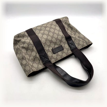 Gucci Tote Toile GG Beige et Cuir Brun - vue de trois quarts, anses déployées