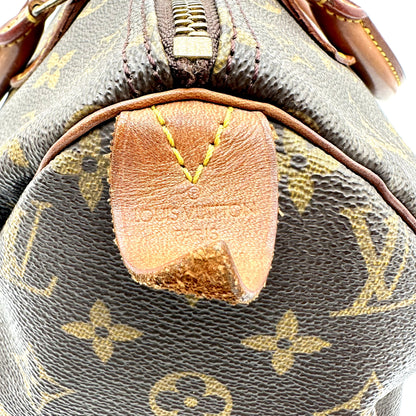 Louis Vuitton Speedy 30 Toile Monogram - détail de la patte de cuir d'extrémité