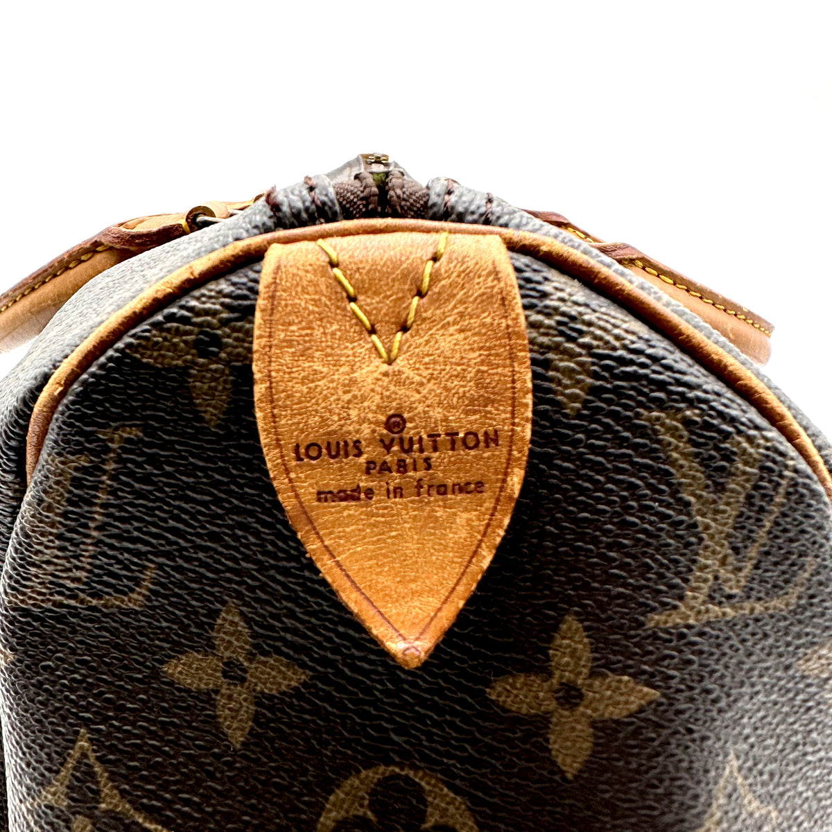 Louis Vuitton Speedy 40 Monogram-Canvas - Detail der Lederlasche am Ende