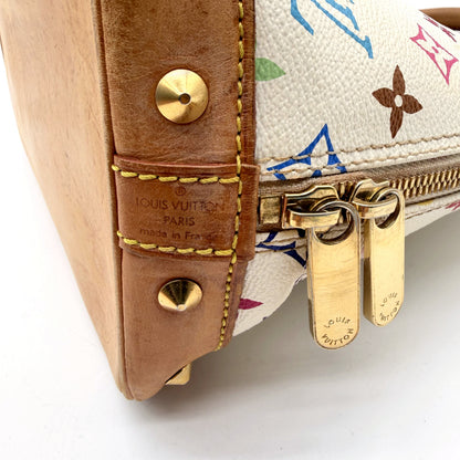 Louis Vuitton Alma Toile Monogram Multicolore Blanc - détail d'un coin bas, clou doré et patte de cuir