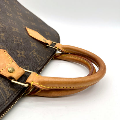 Louis Vuitton Alma Toile Monogram - détail des anses et de leurs attaches