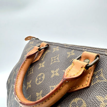 Louis Vuitton Speedy 35 Toile Monogram - détail d'une anse et de son attache