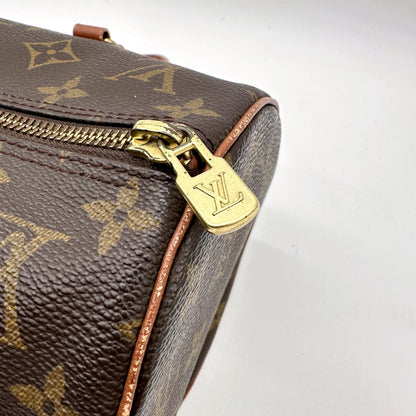 Louis Vuitton Papillon 30 Toile Monogram - détail du zip et de sa tirette dorée