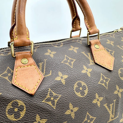Louis Vuitton Speedy 30 Toile Monogram - détail des anses et de leurs attaches