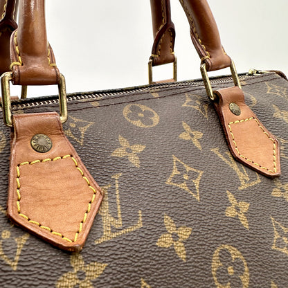 Louis Vuitton Speedy 30 Toile Monogram - détail des anses et de leurs attaches