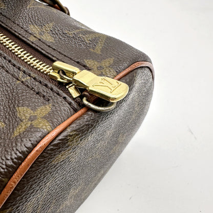 Louis Vuitton Papillon 30 Toile Monogram - détail du zip et de sa tirette dorée