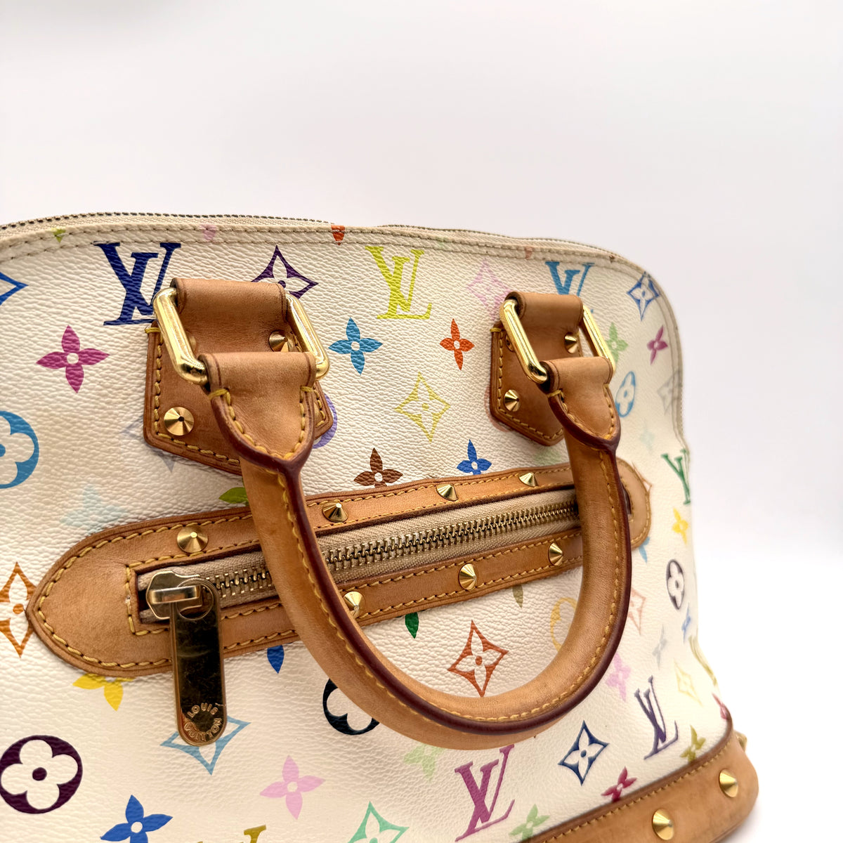 Louis Vuitton Alma Toile Monogram Multicolore Blanc - détail des anses et du haut du sac