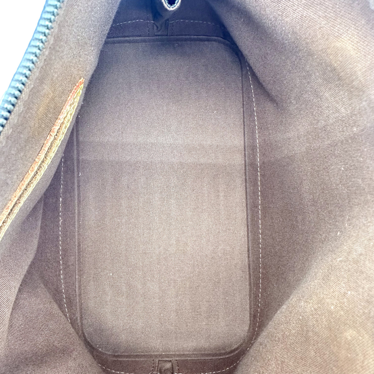 Louis Vuitton Alma Toile Monogram - intérieur ouvert, doublure claire