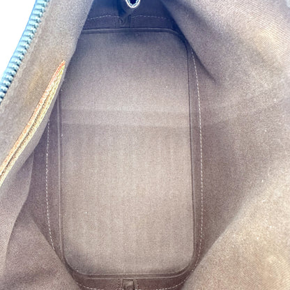 Louis Vuitton Alma Toile Monogram - intérieur ouvert, doublure claire