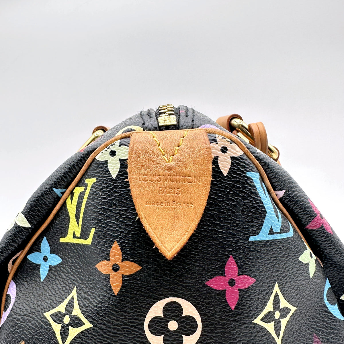 Louis Vuitton Speedy 30 Toile Monogram Multicolore Noir - détail de la patte de cuir d'extrémité