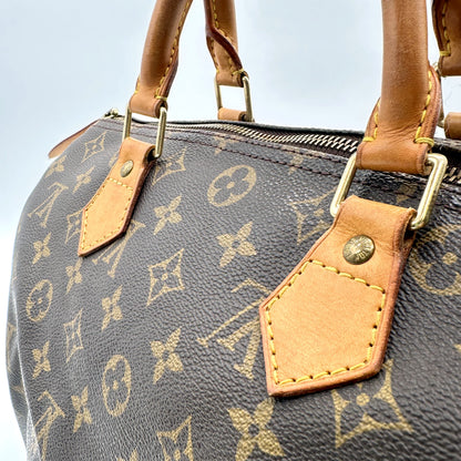 Louis Vuitton Speedy 30 Toile Monogram - détail des anses, pattes et rivets