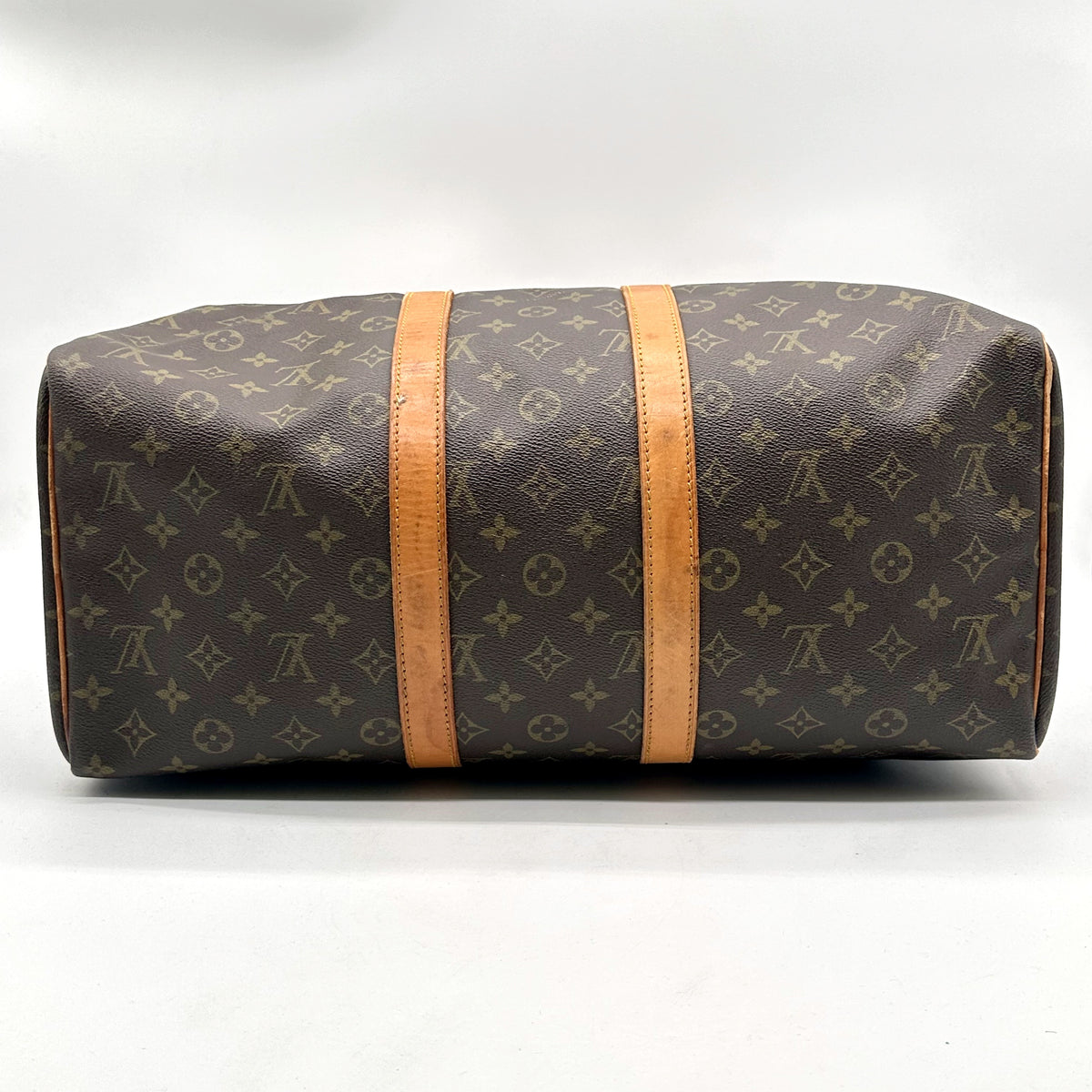 Louis Vuitton Keepall 45 Toile Monogram - vue du dessous, base et bande de cuir