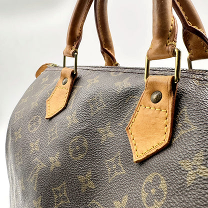 Louis Vuitton Speedy 30 Toile Monogram - détail des anses et attaches, autre côté