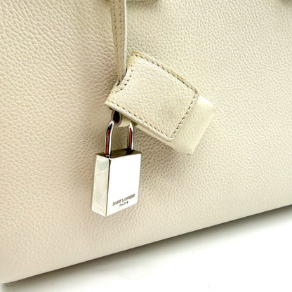 Saint Laurent Sac de Jour Baby cuir grainé blanc cassé - clochette et cadenas Saint Laurent