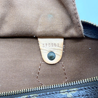 Louis Vuitton Speedy 30 toile Monogram - gros plan de la poche intérieure et de son code date