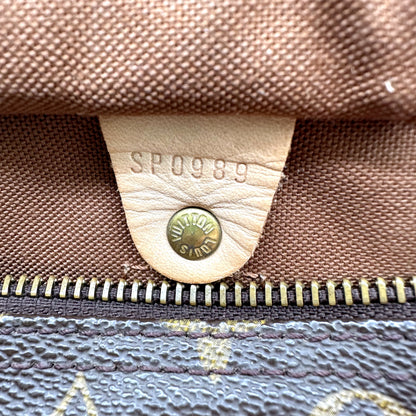 Louis Vuitton Speedy 30 Toile Monogram - détail de l'intérieur et de sa patte de cuir