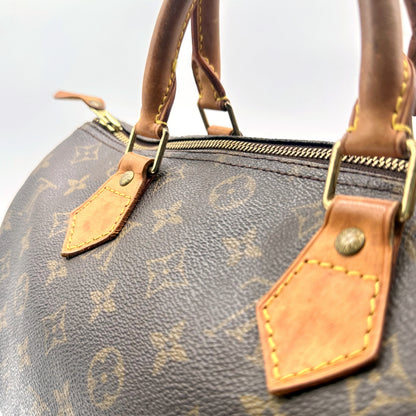 Louis Vuitton Speedy 30 Toile Monogram - détail des anses et attaches, autre côté
