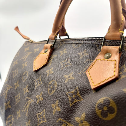 Louis Vuitton Speedy 35 Toile Monogram - détail des anses et attaches, autre côté