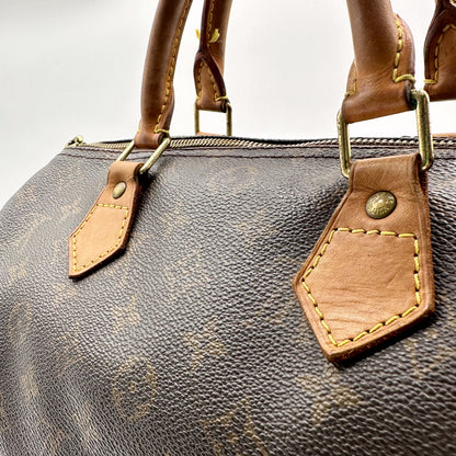 Louis Vuitton Speedy 30 Toile Monogram - détail des anses et attaches, autre côté