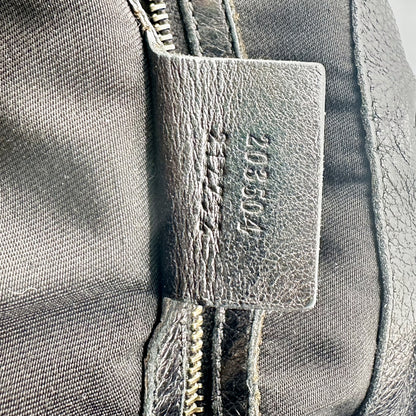 Gucci Hobo Toile GG Noir - détail de la patte de référence à l'intérieur