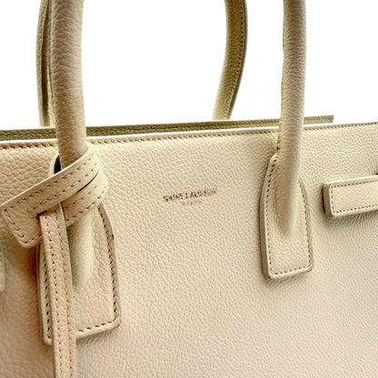 Saint Laurent Sac de Jour Baby cuir grainé blanc cassé - estampille SAINT LAURENT sur le cuir