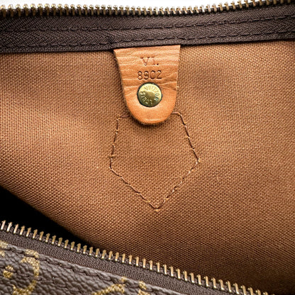 Louis Vuitton Speedy 35 toile Monogram - gros plan de la poche intérieure et de son code date