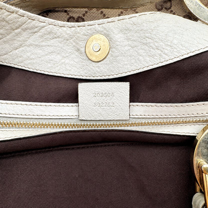Gucci Tote Toile GG Beige et Cuir Crème - détail de l'étiquette intérieure et de la référence