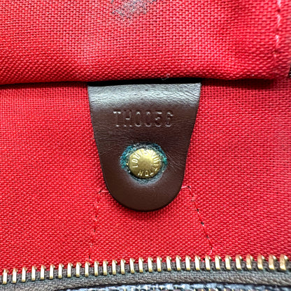 Louis Vuitton Speedy 30 Toile Damier Ebène - détail de la doublure intérieure et de sa patte de cuir